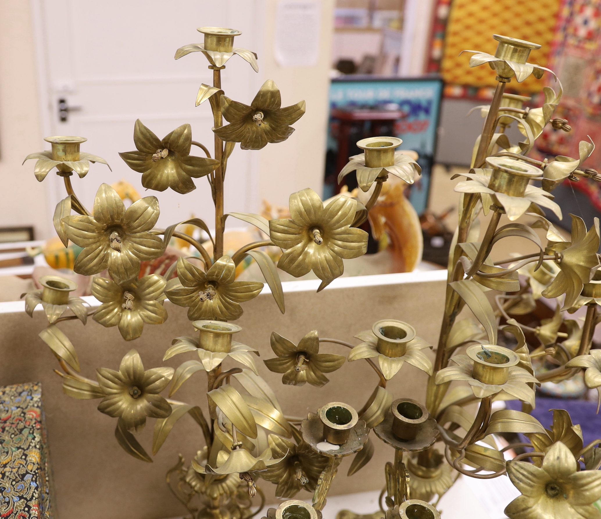 Three pairs of brass plant form candlestands / candelabra